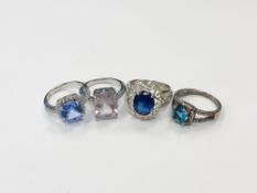 Four silver gem set rings