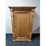 A continental oak sentry cabinet with pillar supports