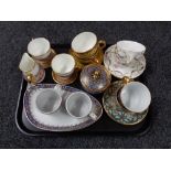 A tray of decorative tea cups and saucers, Fox glove,