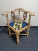 A continental oak barley twist corner chair