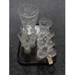 A tray of crystal champagne flutes and wine glasses,