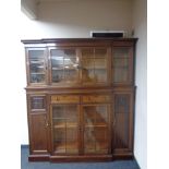A late Victorian mahogany break-front four door bookcase