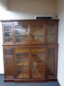 A late Victorian mahogany break-front four door bookcase