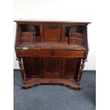 A reproduction mahogany Victorian style writing bureau