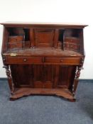 A reproduction mahogany Victorian style writing bureau