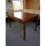 A mid 20th century walnut writing desk