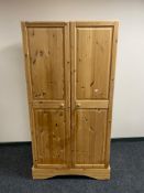 A pine double door wardrobe