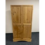 A pine double door wardrobe