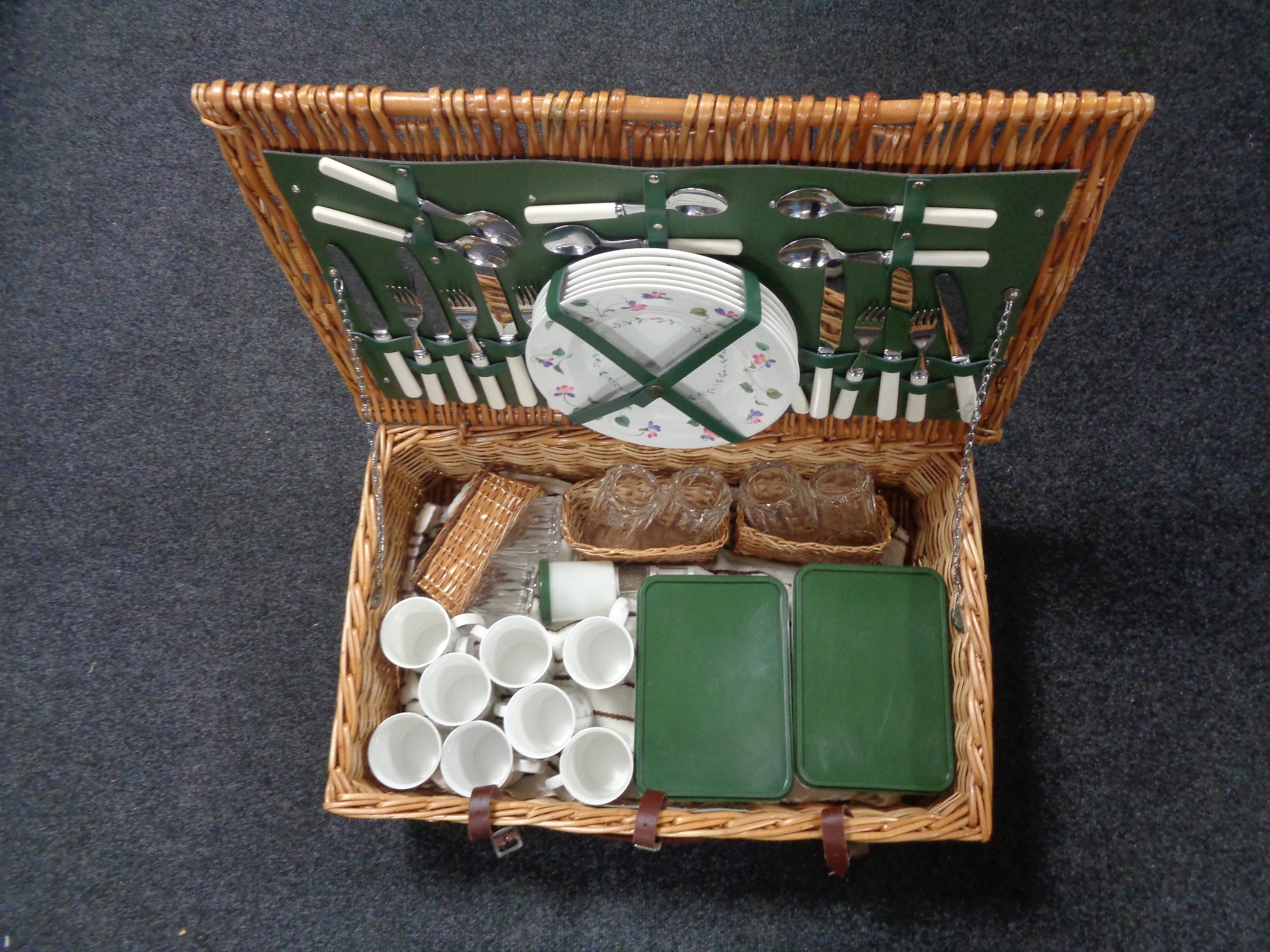 A picnic set in wicker hamper