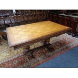 A continental oak pull out dining table