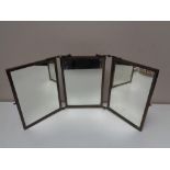 An antique brass three way folding mirror, height 31.5 cm.