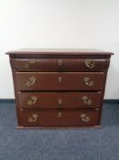 A continental painted pine four drawer chest