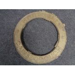 A circular cast iron plaque - Marshalls of Gainsborough