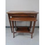 An Edwardian shaped console table and an occasional table