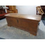 A 19th century oak domed topped shipping trunk, width 147 cm, height 58 cm and depth 65 cm.