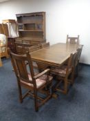 An Old Charm refectory extending table and harlequin set of six chairs