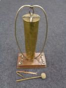 A brass 75 mm trench art ammunition shell table gong, with beater,