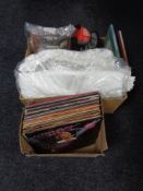 Two boxes of table linen, Christmas decorations, vinyl lps - Elvis,