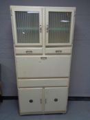 A mid 20th century Shefco painted kitchen cabinet