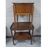 An oak tea trolley and an oak sewing box