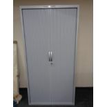A J G Group metal shutter door stationery cabinet with keys,