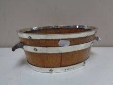 A coopered oak and silver plated barrel shaped wine cooler CONDITION REPORT: 25cm