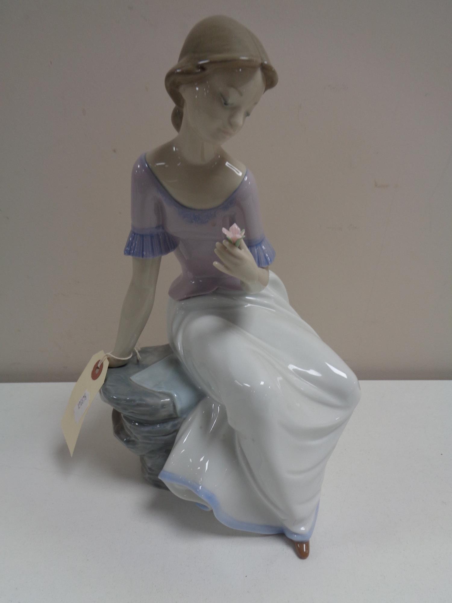 A Nao figure - Lady seated, no.