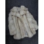 A white mink fur coat