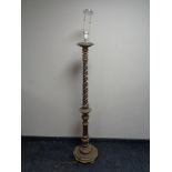 An antique gilt and gesso standard lamp (continental wiring)