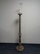 An antique gilt and gesso standard lamp (continental wiring)