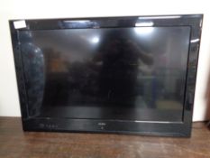 An Alba 32 inch LCD TV (no remote or table stand)