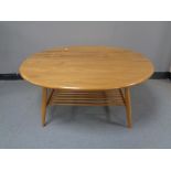 An Ercol elm coffee table with under shelf