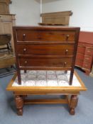 A Danish oak tile topped coffee table together with a mid 20th century three drawer chest