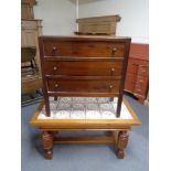 A Danish oak tile topped coffee table together with a mid 20th century three drawer chest