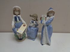 Three Nao figures - Girl with puppy,