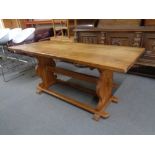 An early 20th century blonde oak refectory table