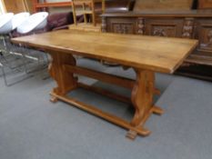 An early 20th century blonde oak refectory table
