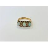 An antique 18ct gold opal and diamond ring,