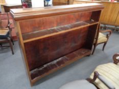 A set of mahogany open shelves