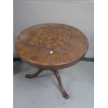 A 19th century mahogany pedestal occasional table with chess board top