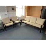 Three piece teak framed lounge suite in yellow fabric