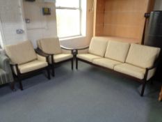 Three piece teak framed lounge suite in yellow fabric