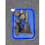 A tray of hand bells