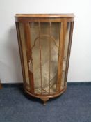 A 1930's walnut D-shaped display cabinet CONDITION REPORT: 75cm wide by 31cm deep