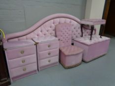 A six piece pink dralon bedroom set