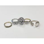 Five silver dress rings