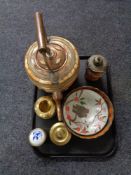 A tray of brass and copper ware, Indian copper teapot, bowls,