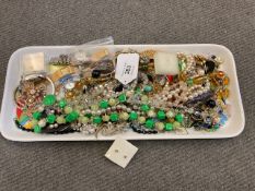A quantity of costume jewellery, beads, necklaces etc.
