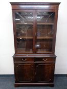 A Regency style double door bookcase