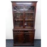 A Regency style double door bookcase